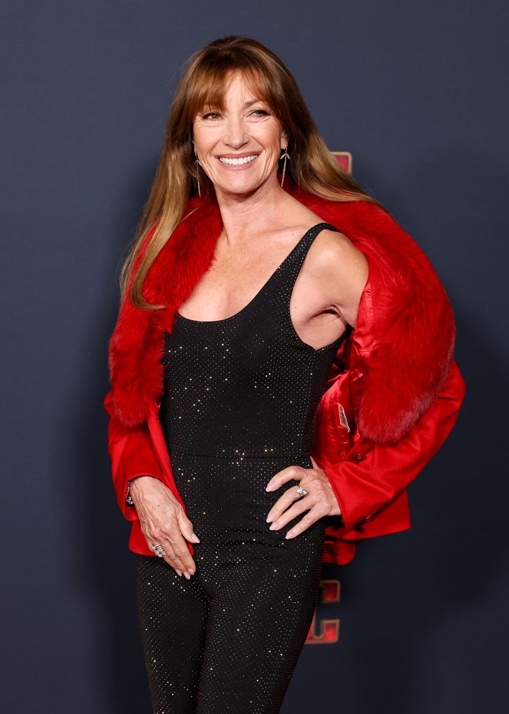 jane seymour black dress red shrug