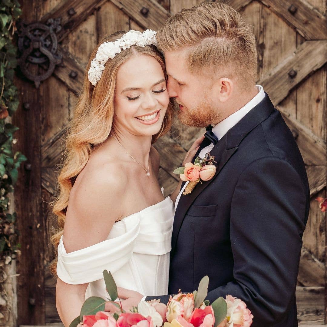 Couple posing for wedding photos