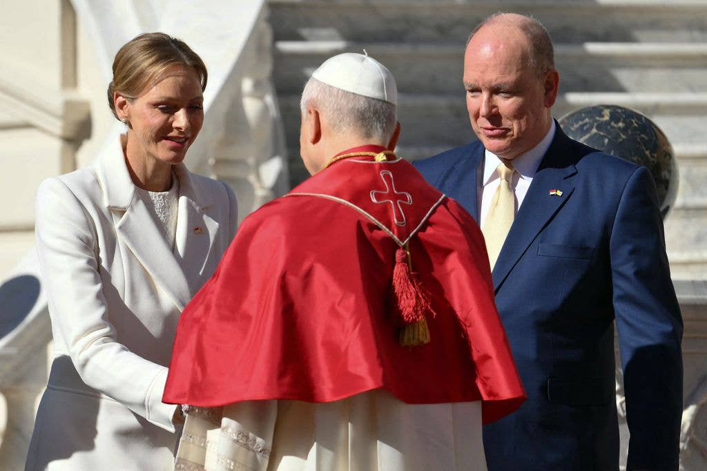 Princess Charlene and Prince Albert II of Monaco greet Pope Leo XIV during a welcome ceremony in the Prince's Palace of Monaco in Monte Carlo