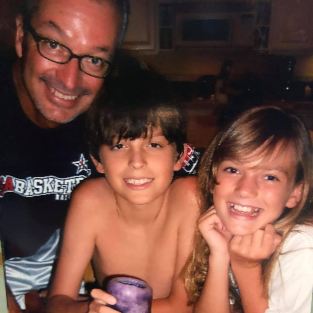 Jennifer Runyon's husband Todd Corman poses with kids Bayley and Wyatt for a photo, shared on Facebook