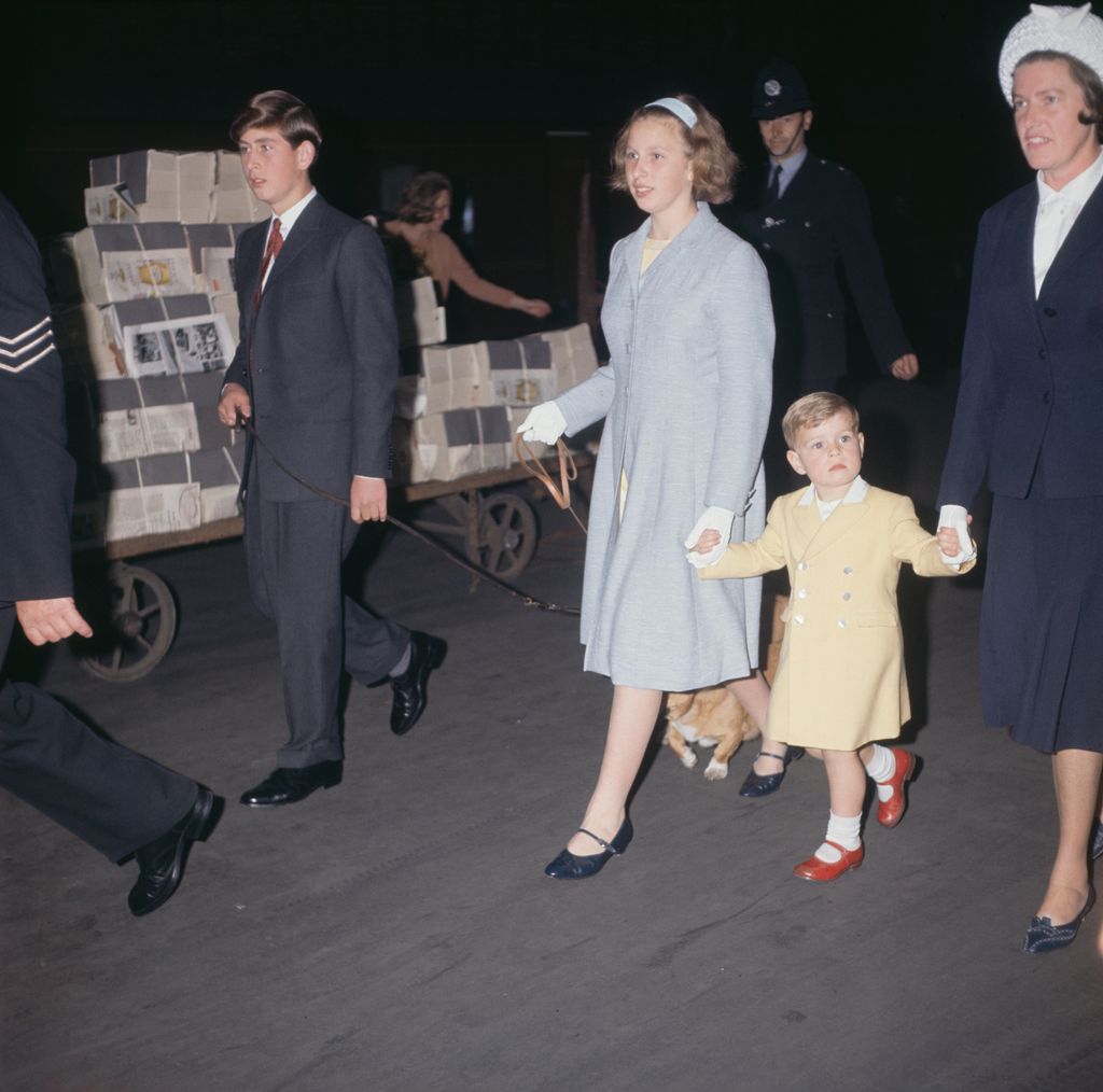 Charles, Princess Anne, Prince Andrew and his nanny Mabel Anderson at Euston Station in 1963