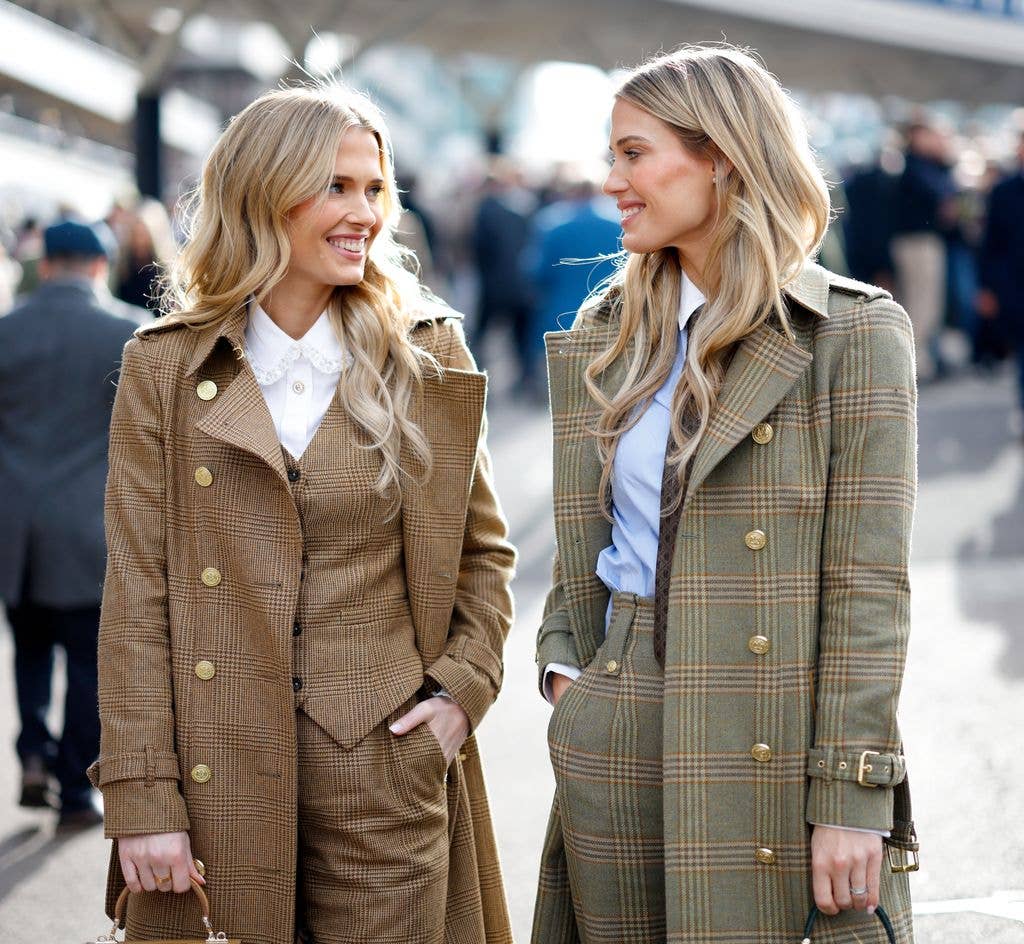 Lady Eliza Spencer and Lady Amelia Spencer facing eachother in tweed suits