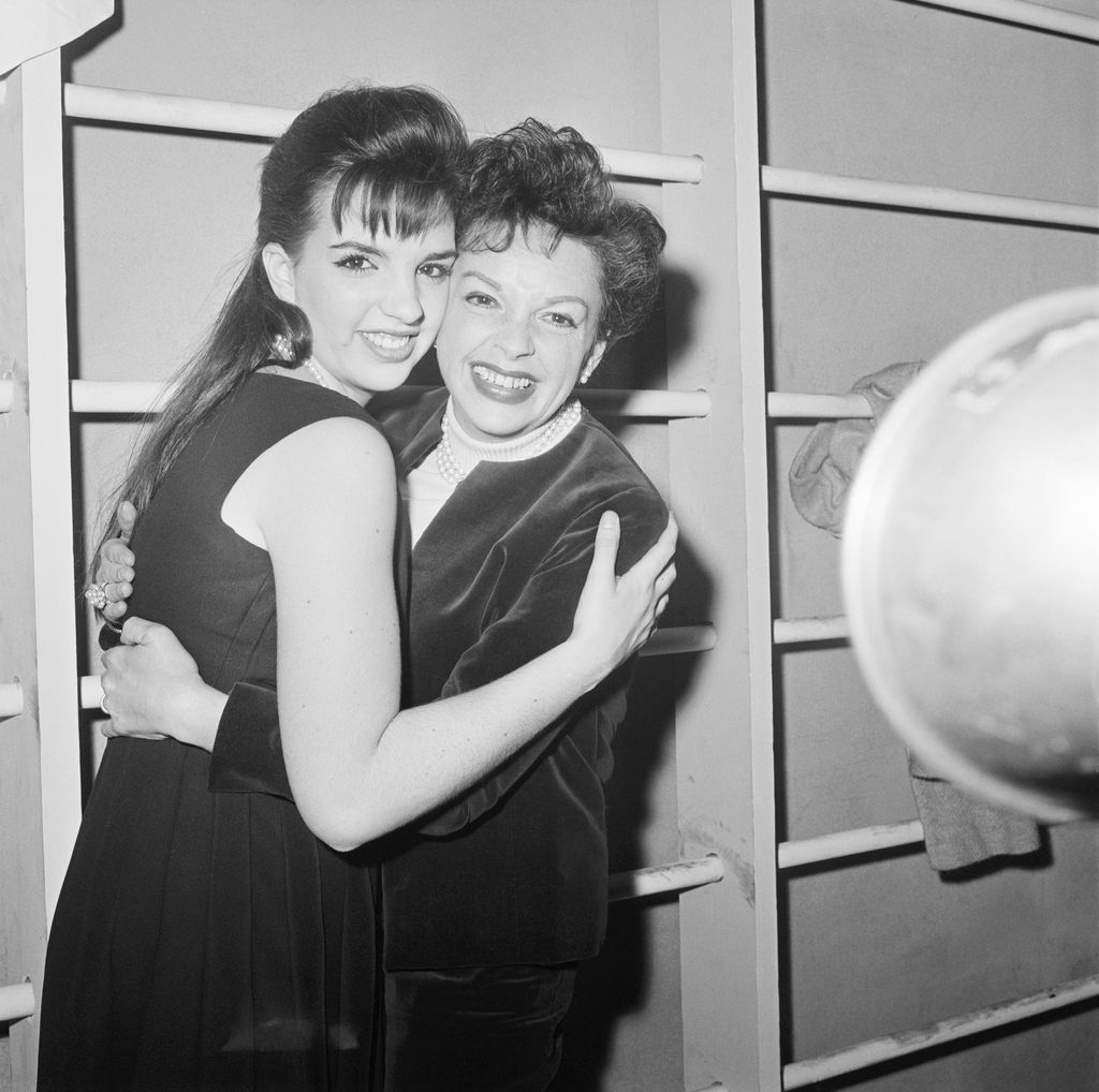 Judy Garland hugs her daughter Liza Minnelli.