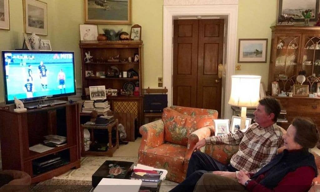 Princess Anne and Sir Timothy Laurence sit in living room watching TV at Gatcombe Park