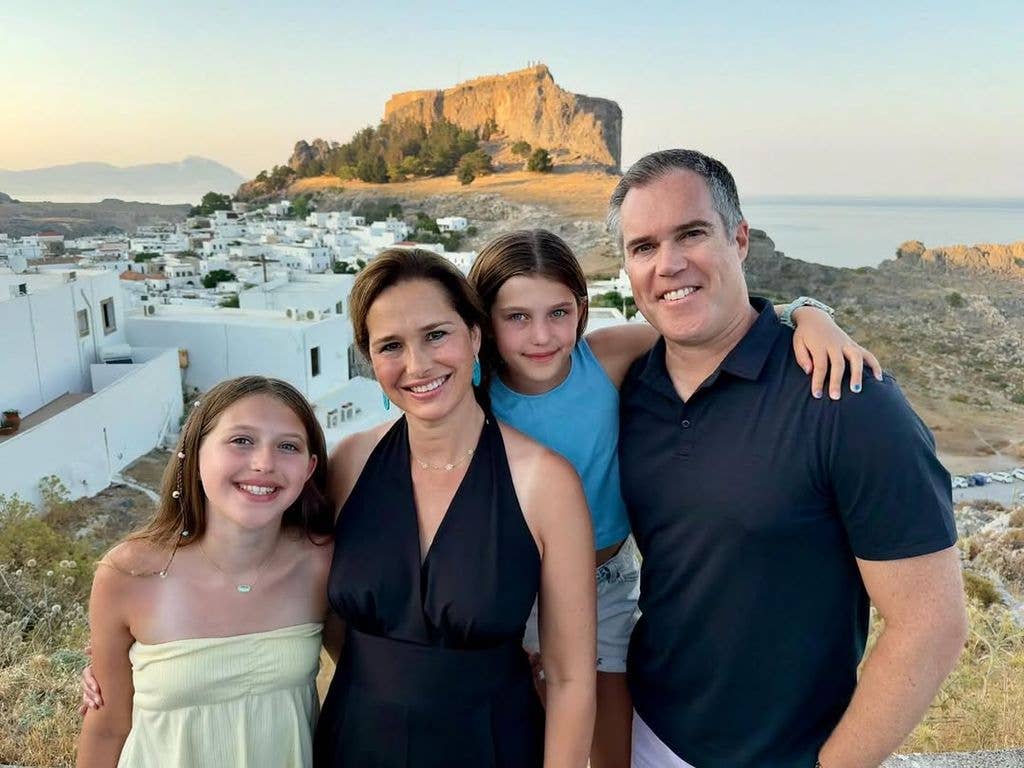 Peter with his wife and two young daughters