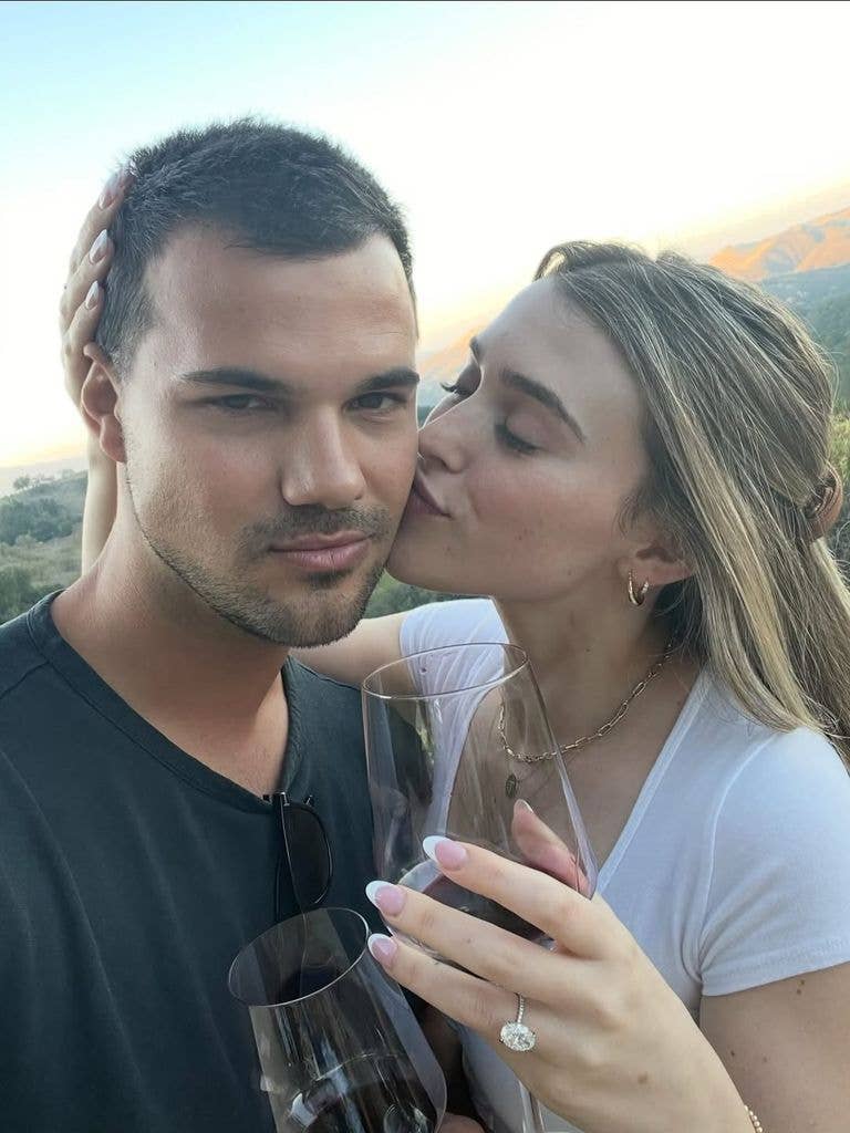 taylor lautner wife tay cheek kiss