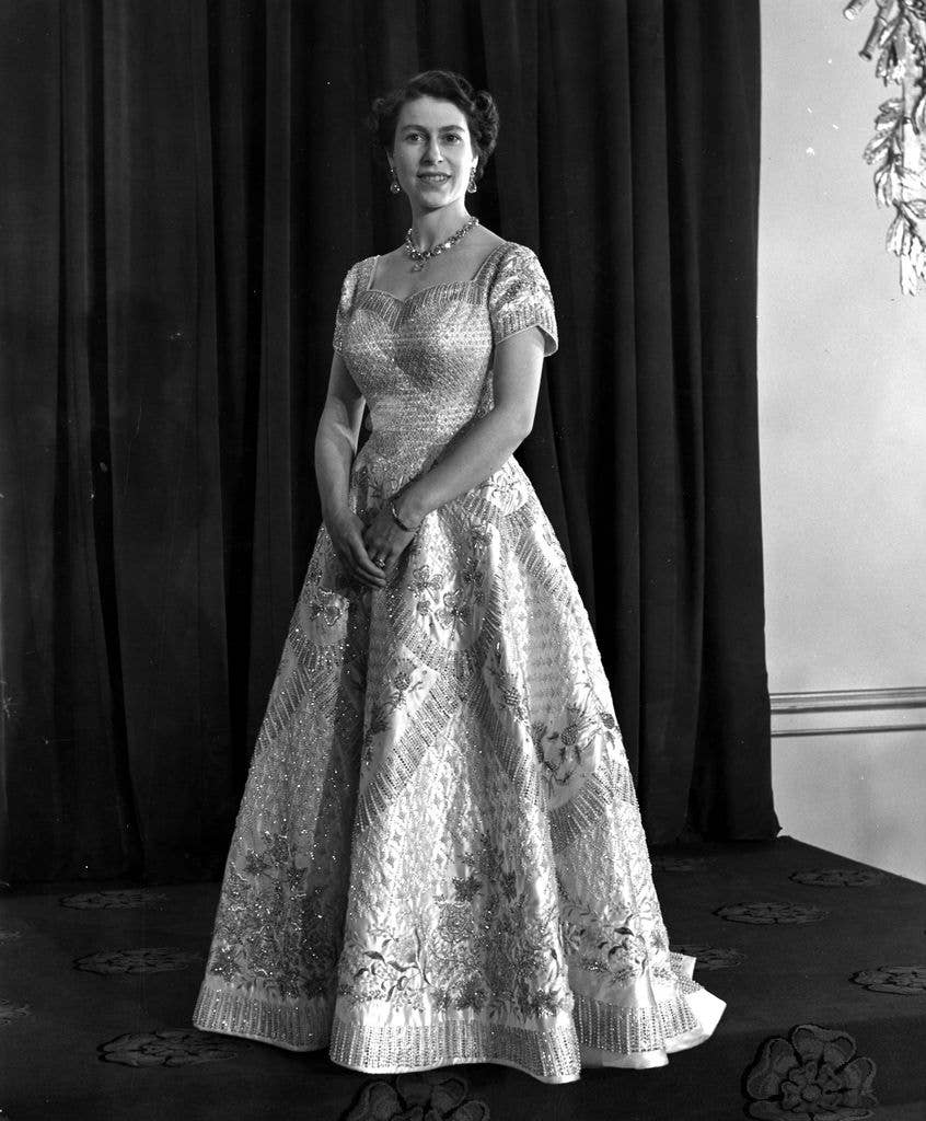 Queen Elizabeth II wearing her Coronation gown designed by Norman Hartnell 
