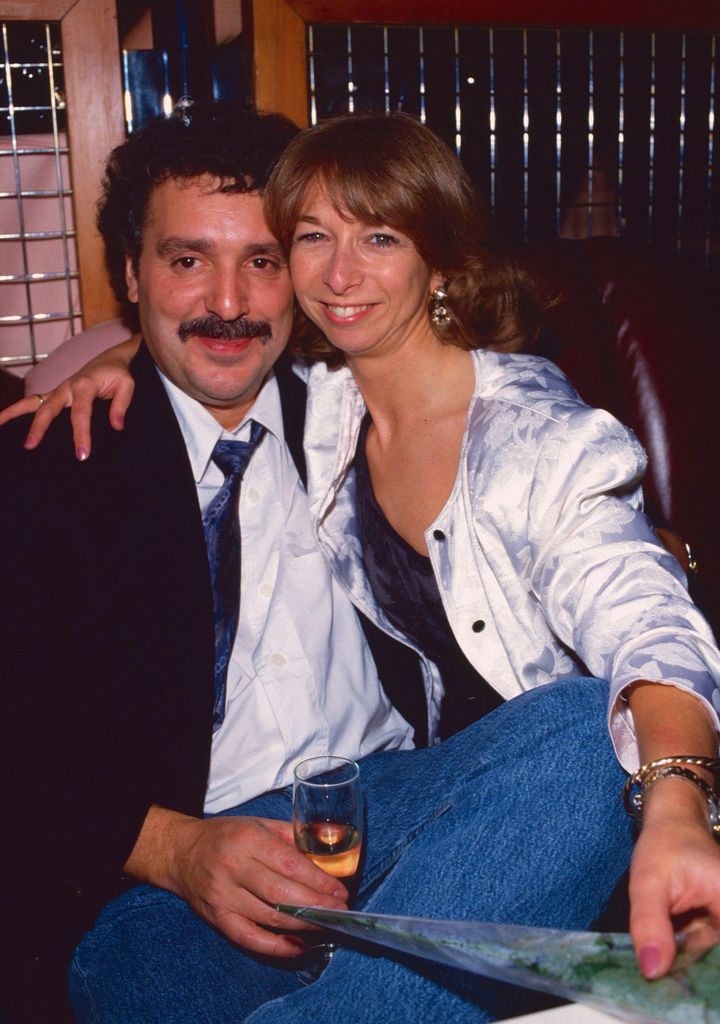 Michael Angelis and Helen Worth embracing in a photo