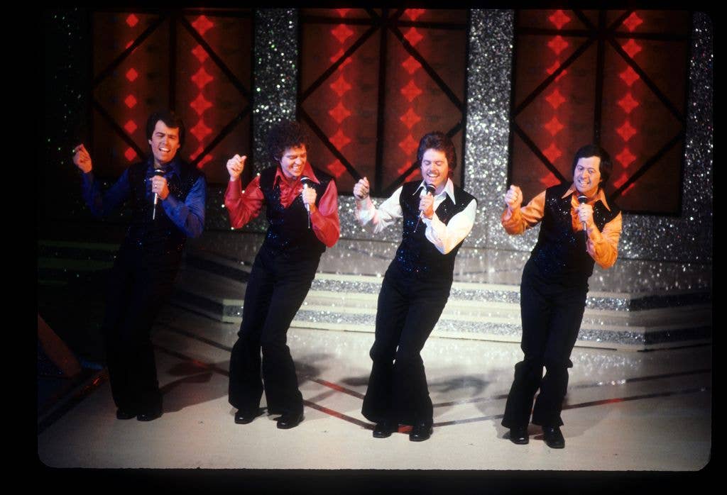 Alan, Jay, Merrill and Wayne osmond onstage