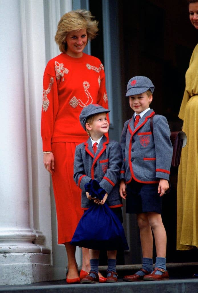 Princess Diana with a young Prince Harry and Prince William in school uniform