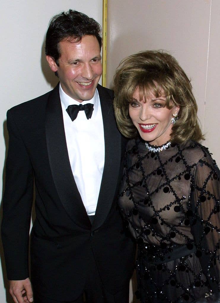 Joan Collins and Percy Gibson in 2001