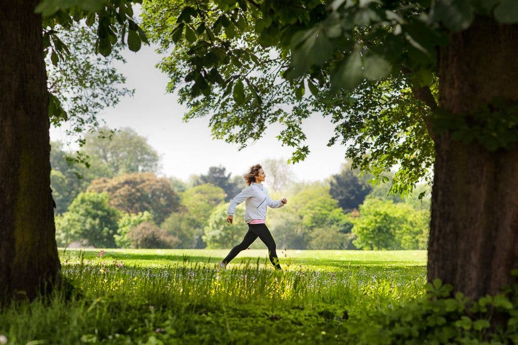 Woman walking excitedly in nature