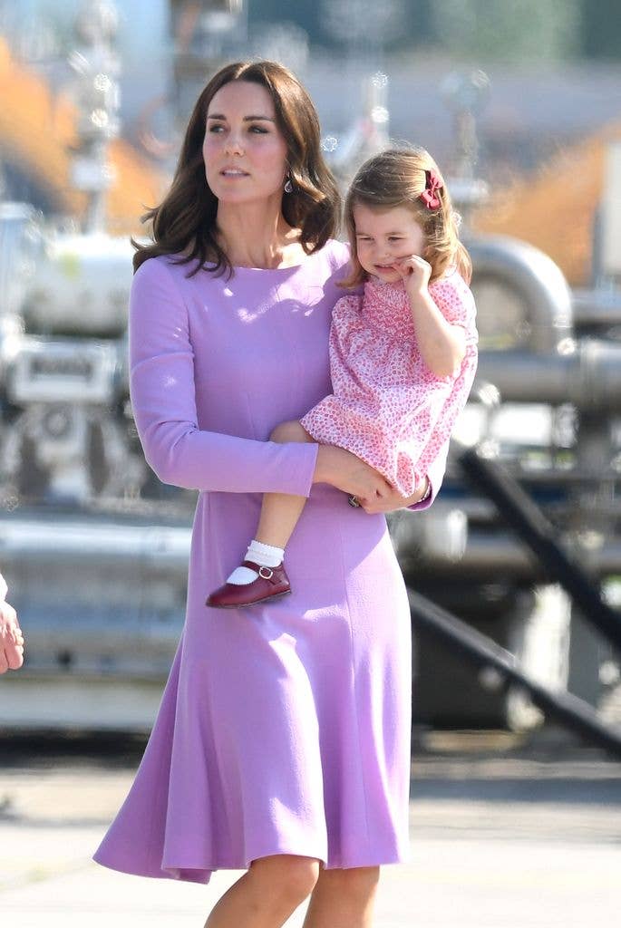 Princess kate holding two-year-old charlotte