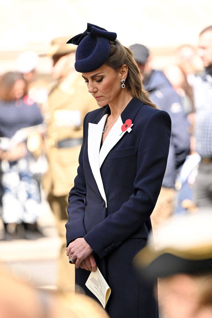 Princess Kate bows her head during Anzac Day service
