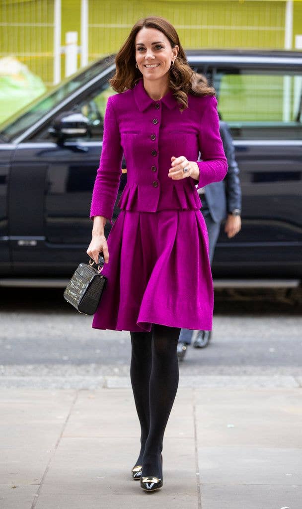 kate in purple skirt and matching cropped jacket