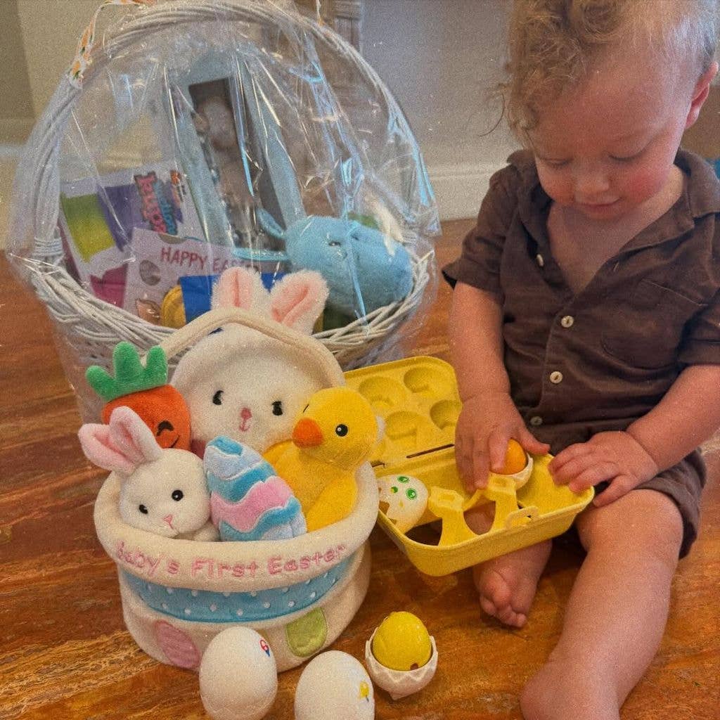 Baby Alexander surrounded by Easter gifts