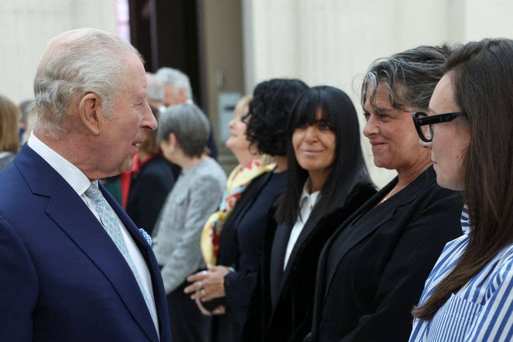 King Charles speaks with British artist Tracey Emin, next to British broadcaster Claudia Winkleman