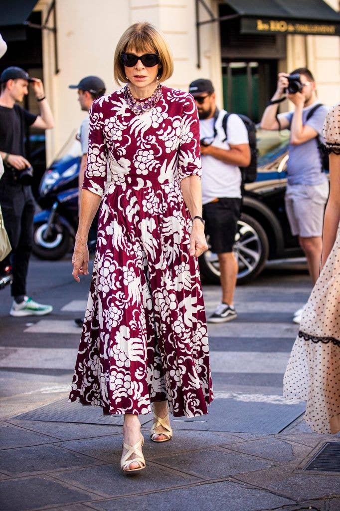 Anna Wintour loves a floral midi dress - consistent with her fashion choices