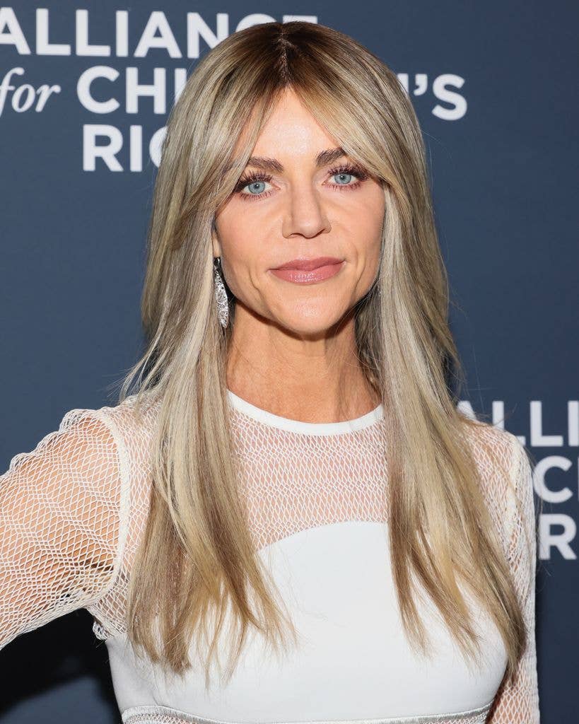 Kaitlin Olson looks glam long hair, somber expression