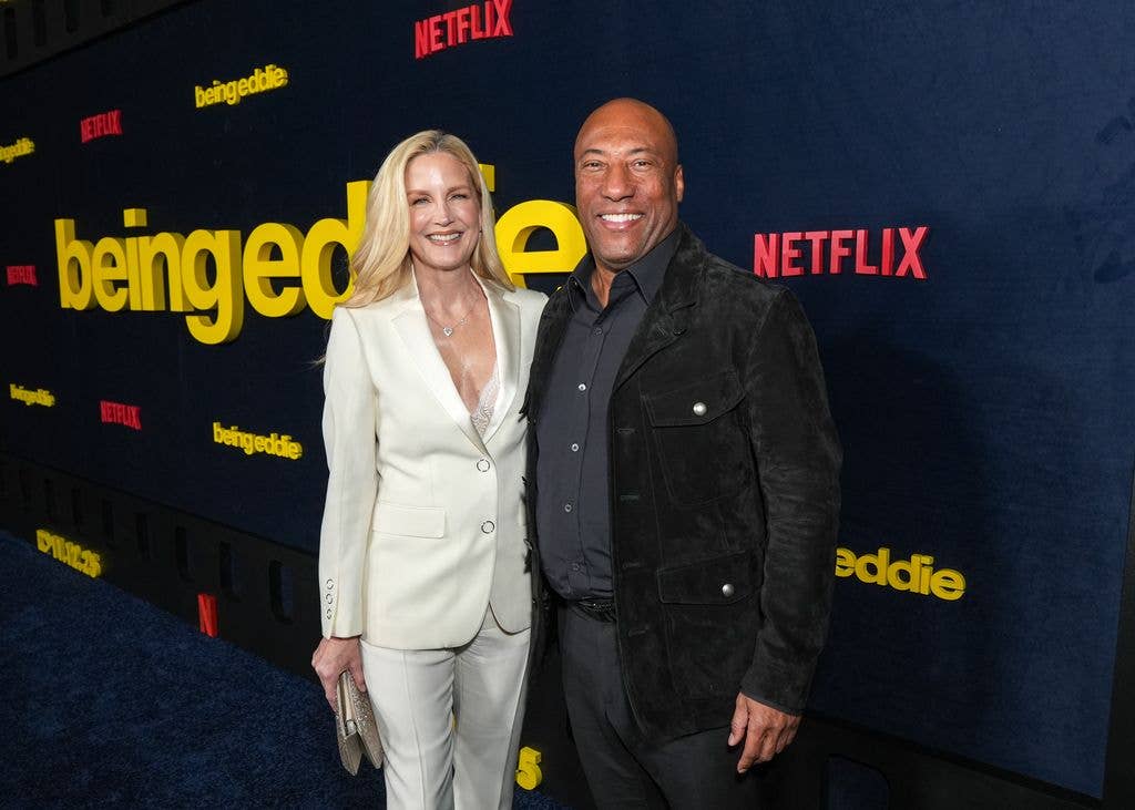 Jennifer Lucas and Byron Allen attend Netflix's "Being Eddie" premiere at Netflix Tudum Theater on November 12, 2025 in Los Angeles, California.