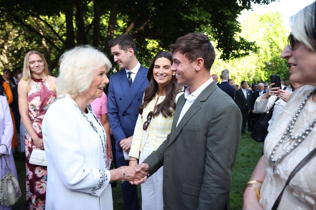  Queen Camilla chats with retired diver and former Olympian Tom Daley 