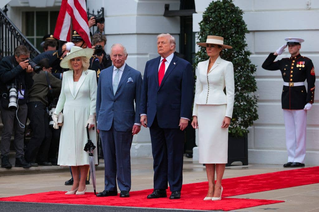 Queen Camila, King Charles, President Donald Trump, and First lady Melania Trump pose during a state arrival ceremony 
