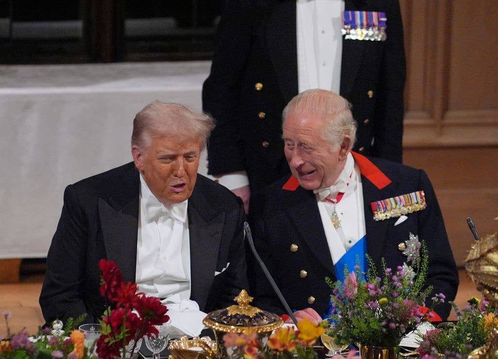 Donald Trump speaks to King Charles III during the State Banquet at Windsor Castle 