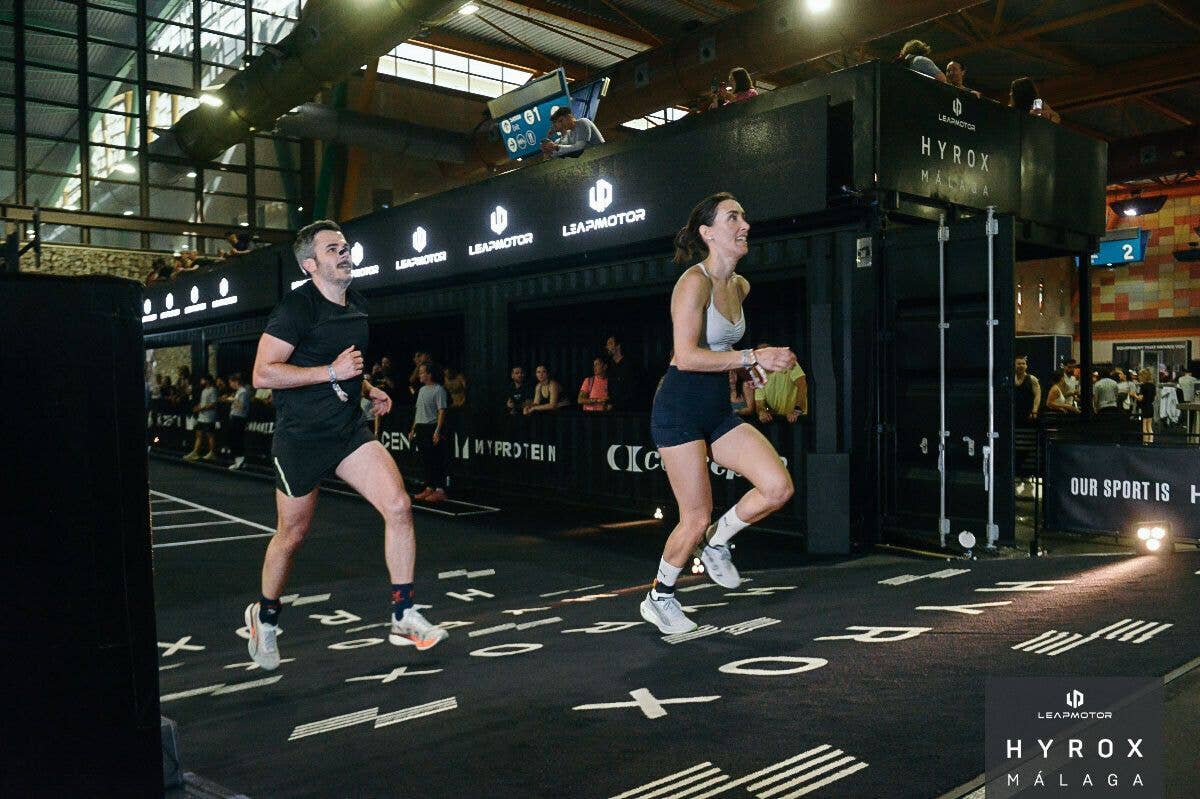 woman running during hyrox