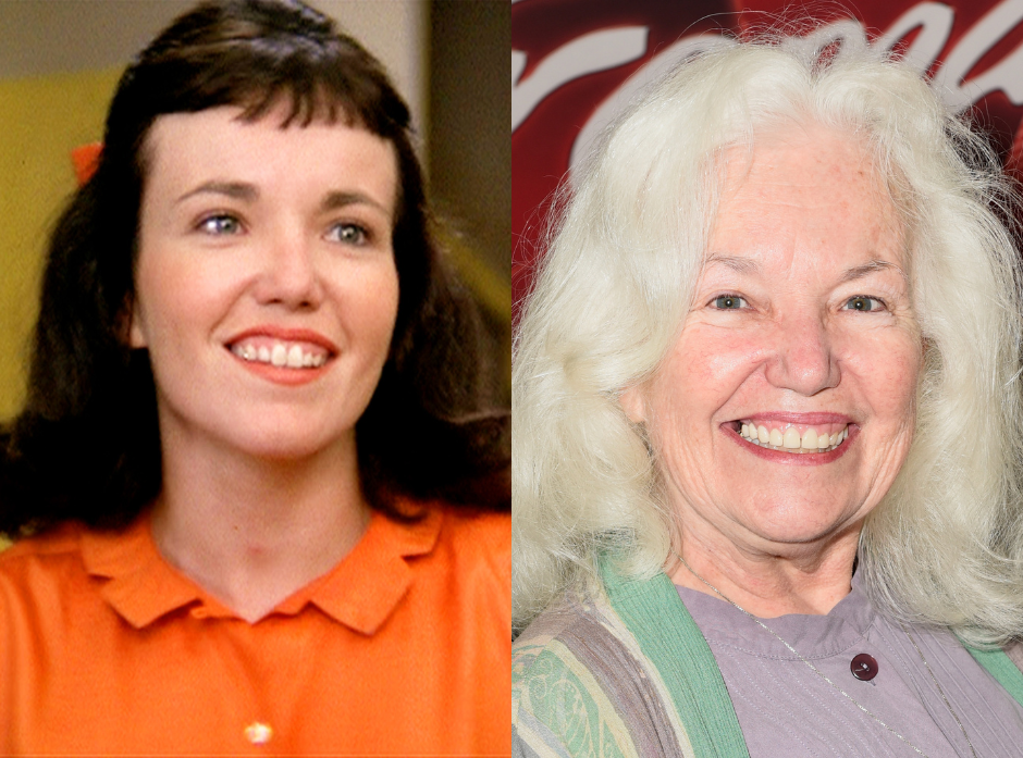 Split image of Jamie Donnelly. Shown on the left with short dark brown hair and a micro fringe with the edge of an orange bow peaking round her hair, wearing an orange shirt with a geometric collar. On the right, standing side on to the camera with short white hair wearing a purple top and green, purple and cream cardigan with a silver necklace.