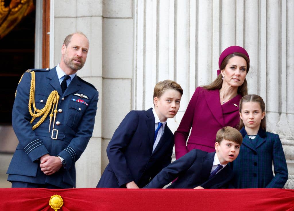 Prince William, Prince George, Prince Louis, Princess Kate, and Princess Charlotte watch a flypast from the balcony of Buckingham Palace