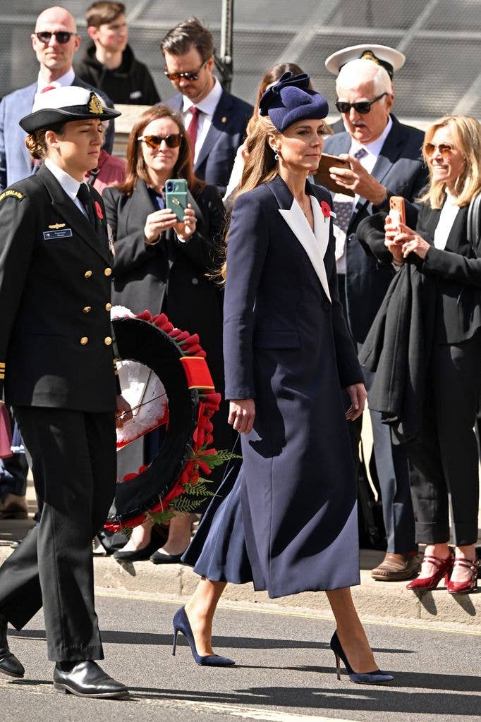 Lieutenant Francesca Hlavac, Royal New Zealand Navy, and Princess Kate attend the wreath laying and parade service as part of the ANZAC Day commemorations at Cenotaph