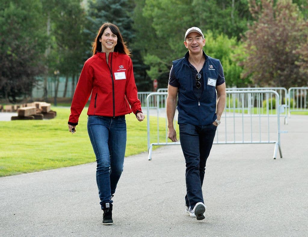 Jeff Bezos and Mackenzie Scott arrive for morning session of the Allen & Co. annual conference at the Sun Valley Resort on July 10, 2013 in Sun Valley, Idaho.