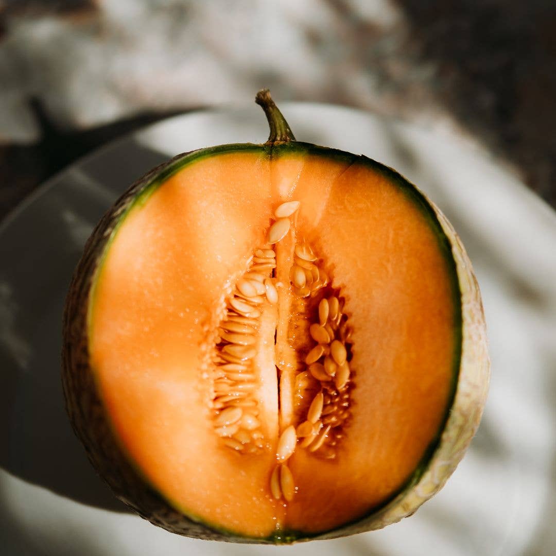 A honeydew melon cut in half 