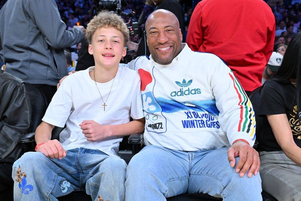 Byron Allen (R) and his son Lucas Byron Allen attend a basketball game between the Los Angeles Lakers and the New York Knicks at Crypto.com Arena on March 08, 2026 in Los Angeles, California. NOTE TO USER: User expressly acknowledges and agrees that, by downloading and or using this photograph, User is consenting to the terms and conditions of the Getty Images License Agreement.