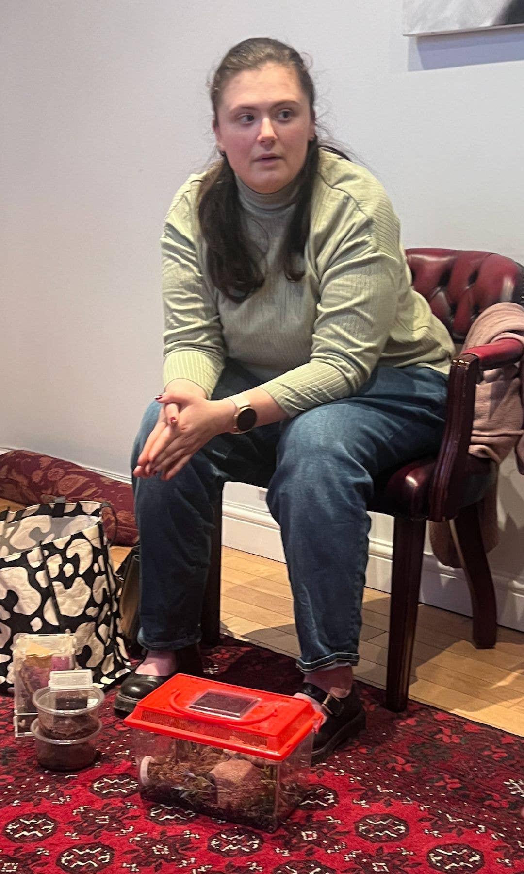 woman with spiders in boxes