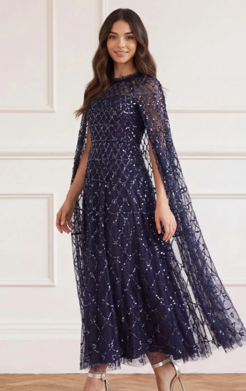 This navy blue dress by Needle & Thread also has a regal feel