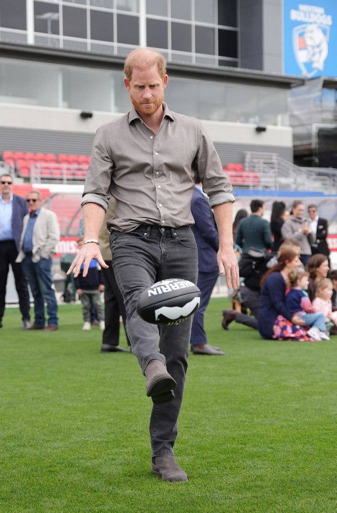 prince harry kicking football