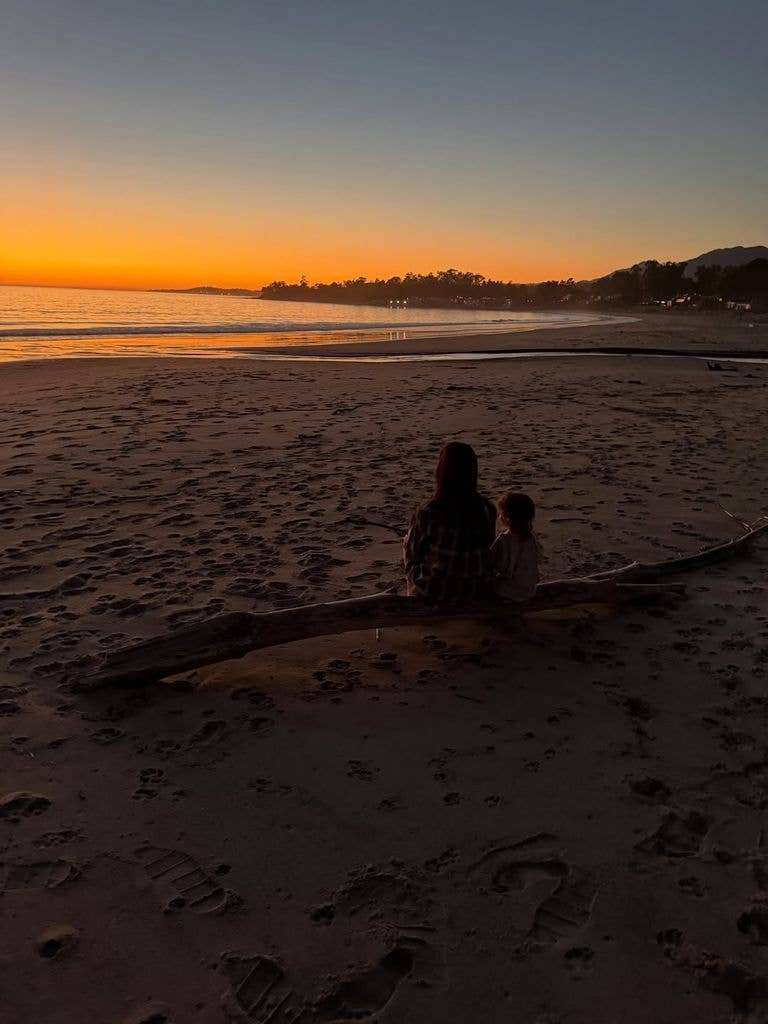 Kourtney on the beach with her son Rocky 