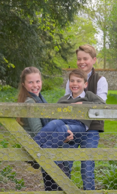 Princess Charlotte and Prince George carry Prince Louis