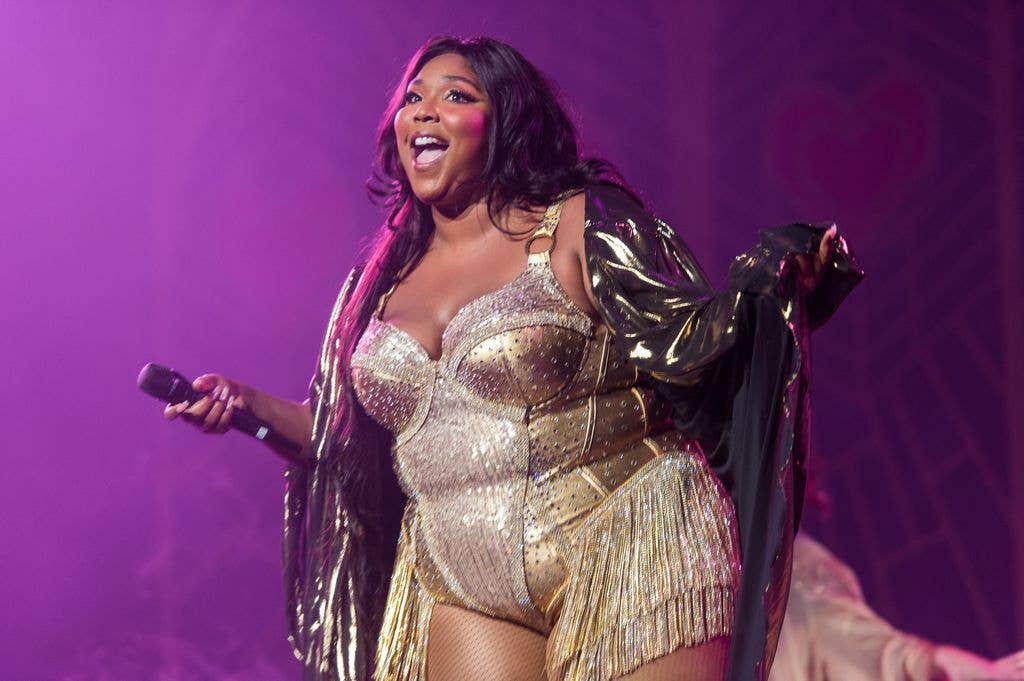 lizzo on stage gold outfit