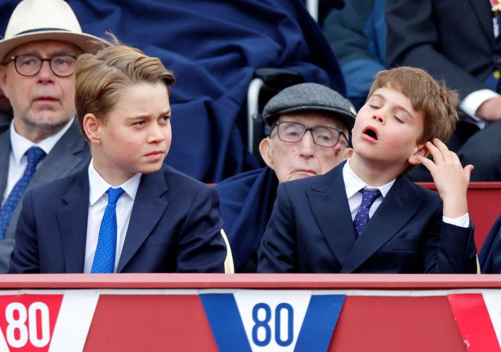 Prince George of Wales and Prince Louis of Wales attend a military procession