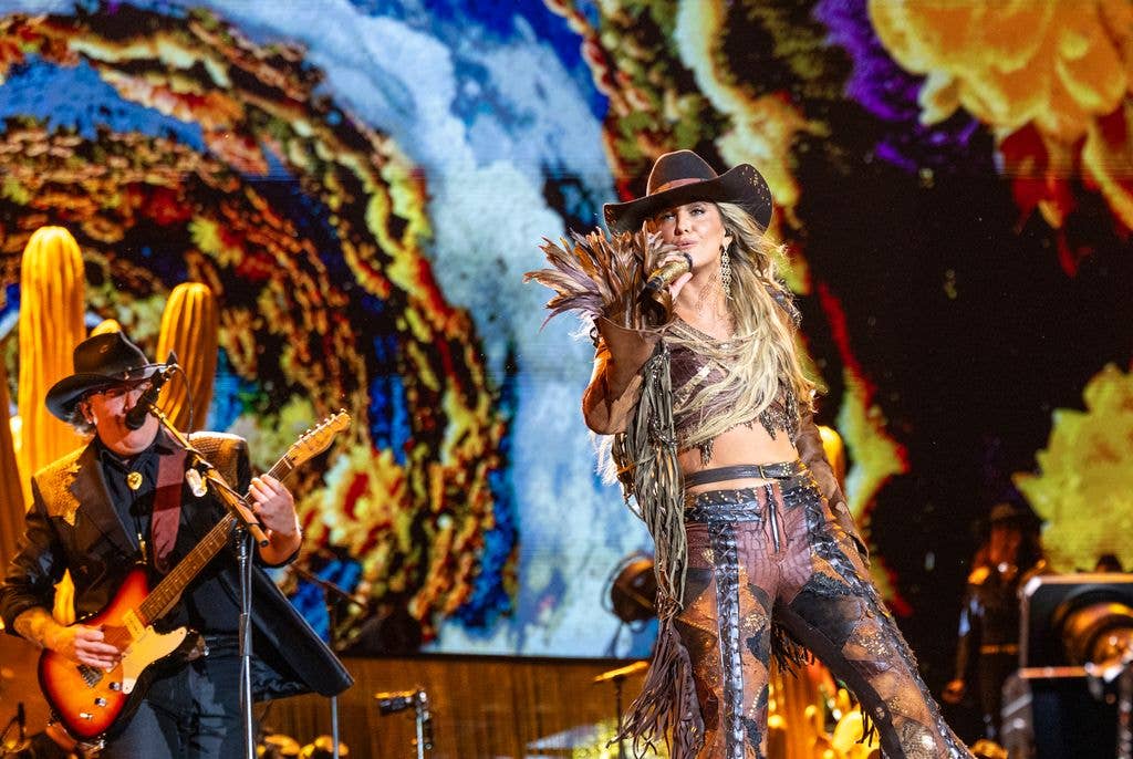 lainey wilson singing onstage
