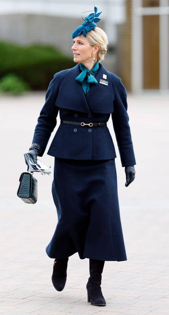 zara tindall in navy skirt set and hat