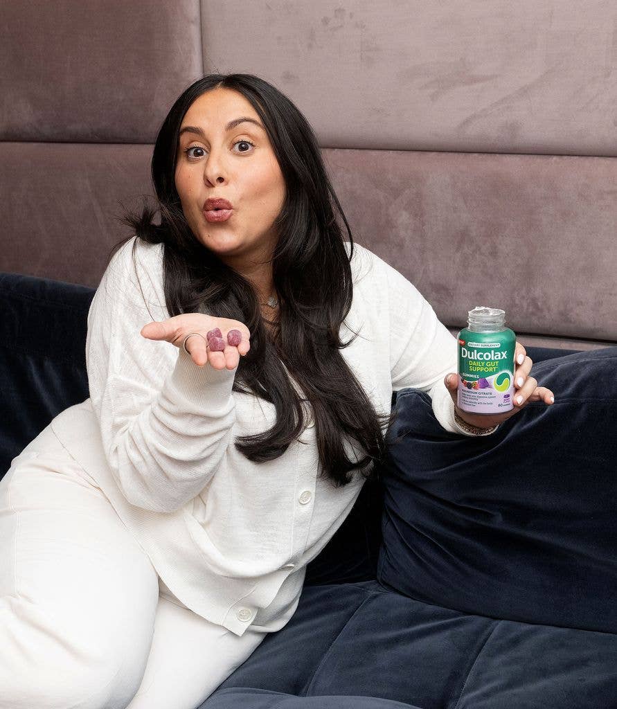 
Claudia with a bottle of Dulcolax blowing kisses

