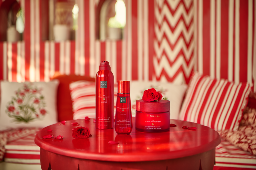 Rituals products on red table