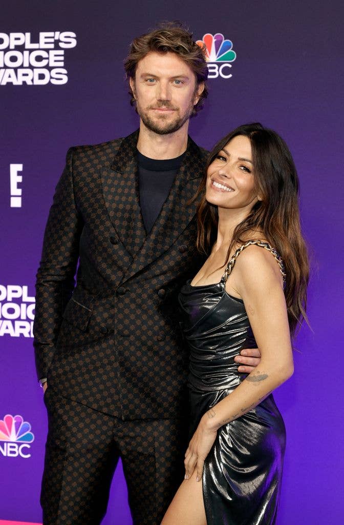 Adam Demos and Sarah Shahi attend the 47th Annual People's Choice Awards at Barker Hangar on December 07, 2021 in Santa Monica, California