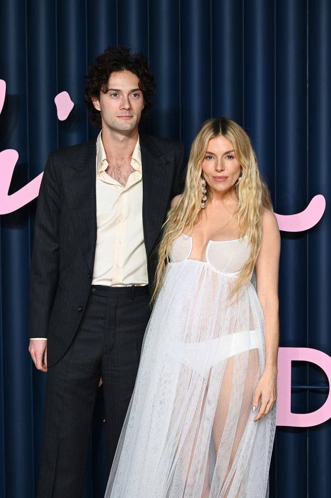 Pregnant Sienna Miller with partner Oli Green