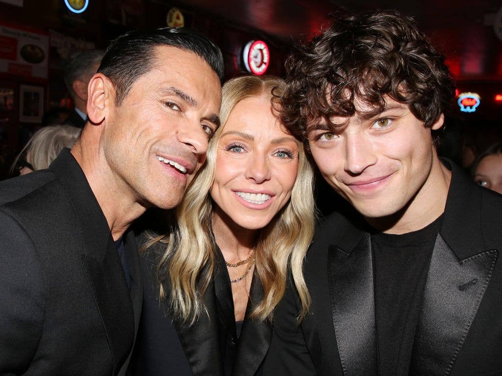 Mark, Kelly and Joaquin pose at the opening night after party 