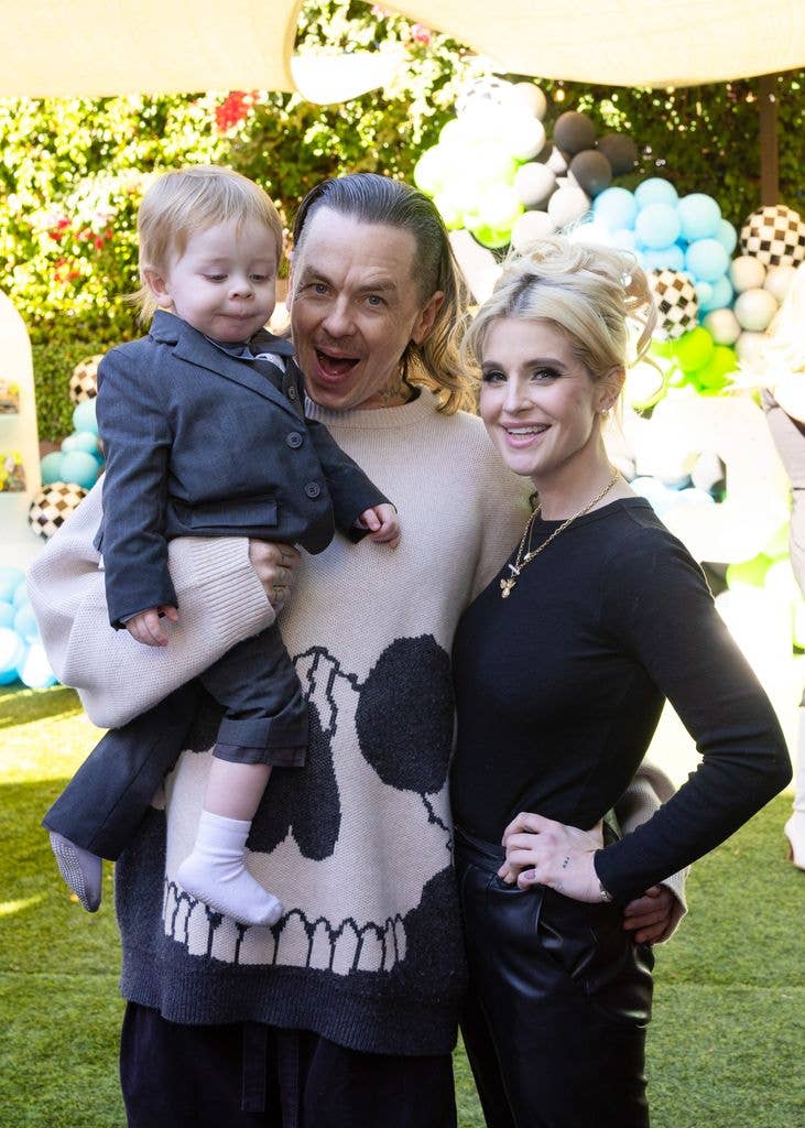 Kelly Osbourne, Sidney Wilson and Sid Wilson smile at camera