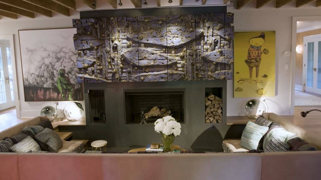 Robert Downey Jr's living room with a green feature fireplace